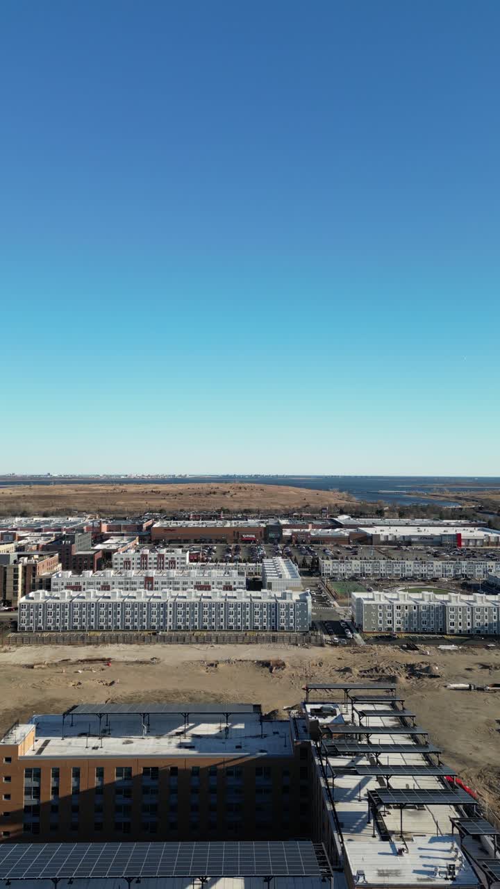 Aerial view over Brooklyn featuring Belt Parkway, Shirley Chisholm State Park, Spring Creek Beach, Pennsylvania Ave, Flatlands Ave, and Howard Beach.