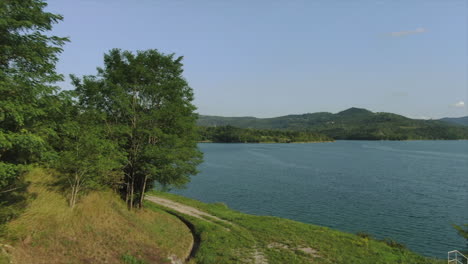 tracking drone shot revealing lake butoniga in croatia