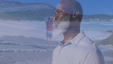 standing on beach, man looking at animation of woman walking by ocean
