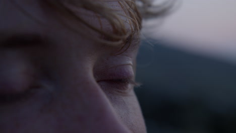 a man’s expression reflects awe at the rugged beauty of dartmoor in devon, england, uk, shallow focus