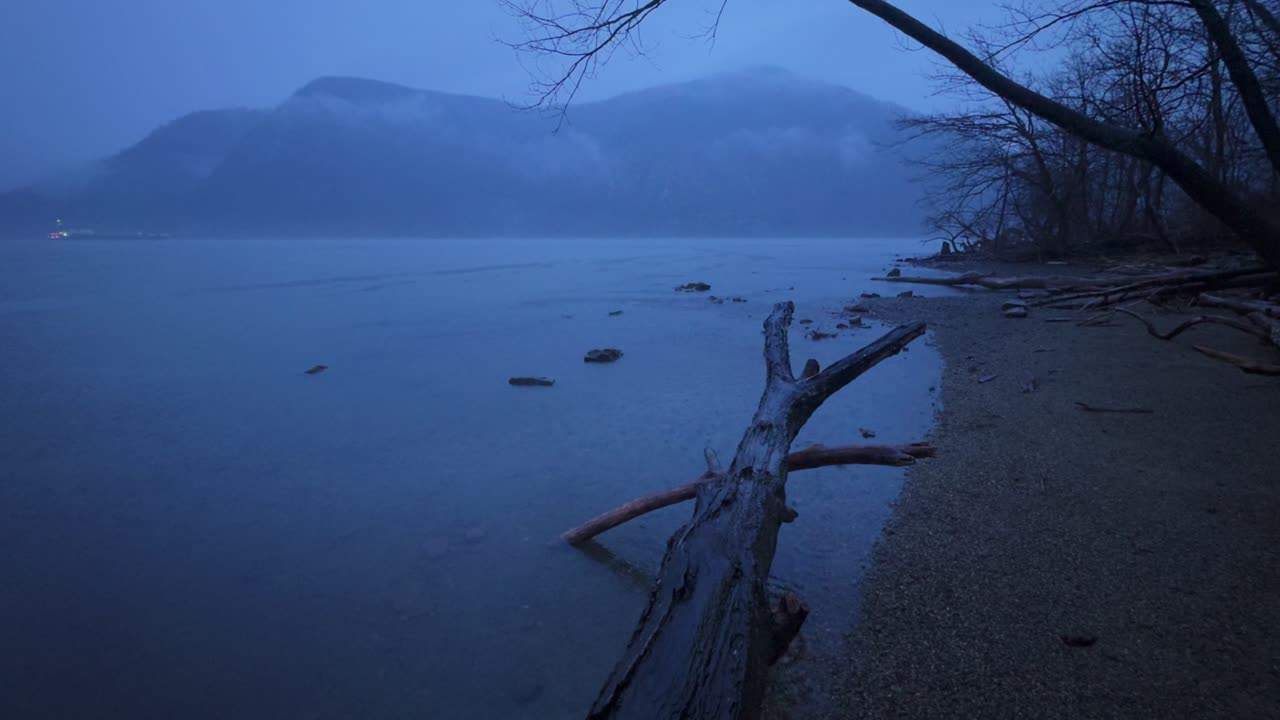 Heavy rain on the Hudson River, in New York's Hudson Valley, during a foggy, mysterious, autumn evening