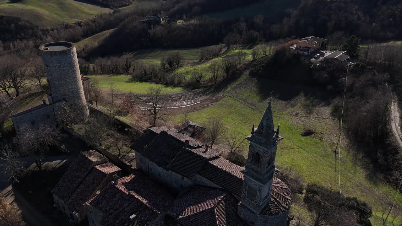 Historic fortified castle of Monteventano overlooking rural hills of Val Luretta in the province of Piacenza Emilia-Romagna Italy