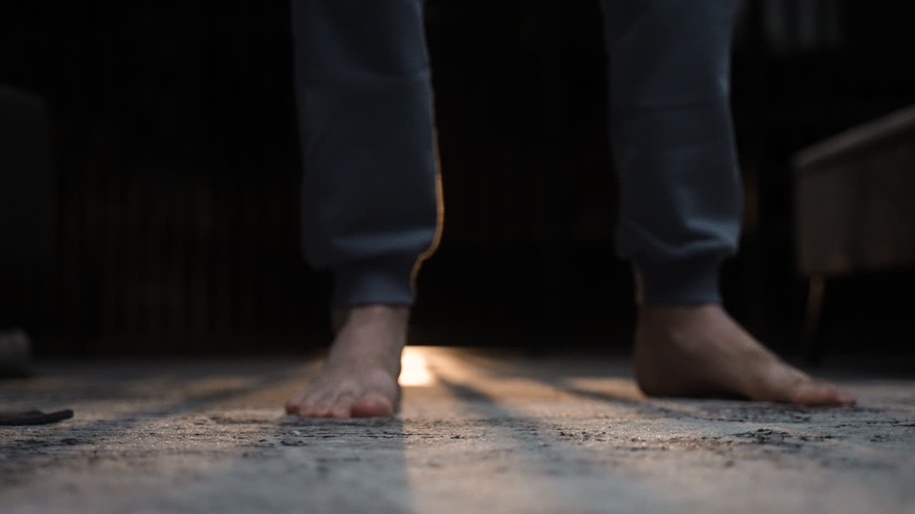 Closeup of man's feet on the floor