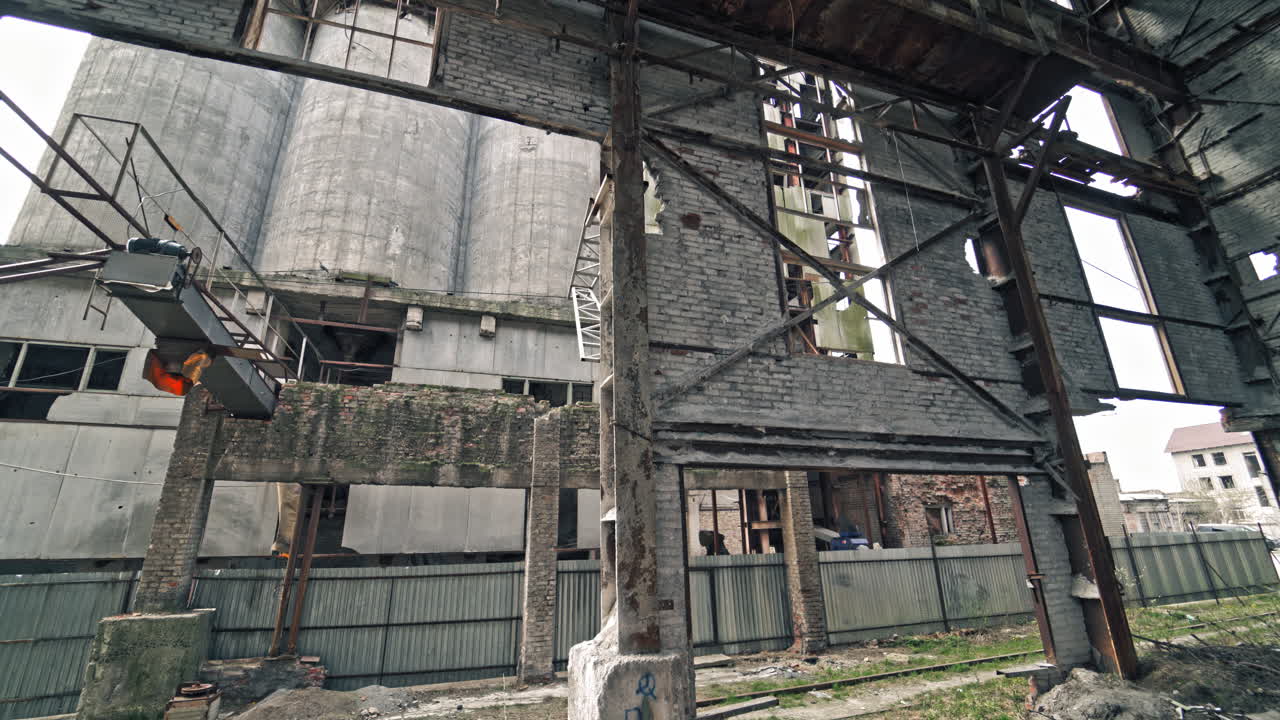Inside ruined factory. Old industrial building for demolition.