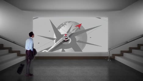 un hombre de negocios se detuvo a mirar una pantalla en la pared.
