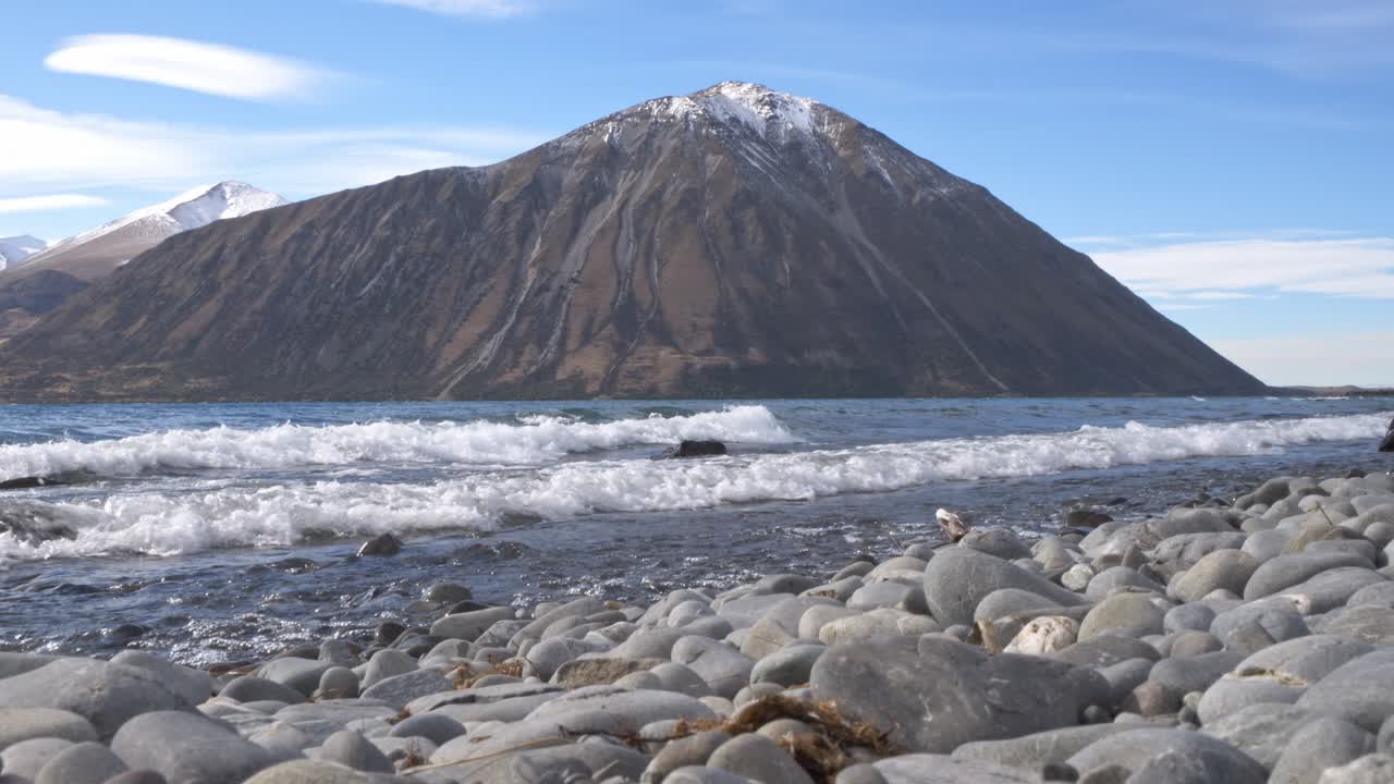 Waves Splashing On Rocky Shore, Lake Ohau In South Island, New Zealand - Wide Shot
