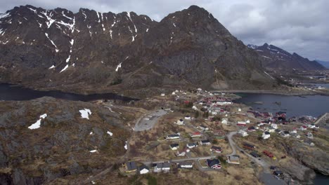 aerial forwarding shot over the village a in lofoten during the end of winter season