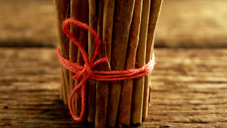 Tied-cinnamon-sticks-on-table-4k