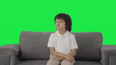 Upset-Indian-boy-slapping-his-head-Green-screen