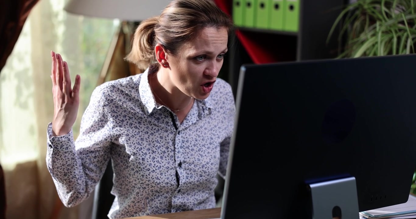 Engaging online discussion sparks lively emotions in a cozy home office