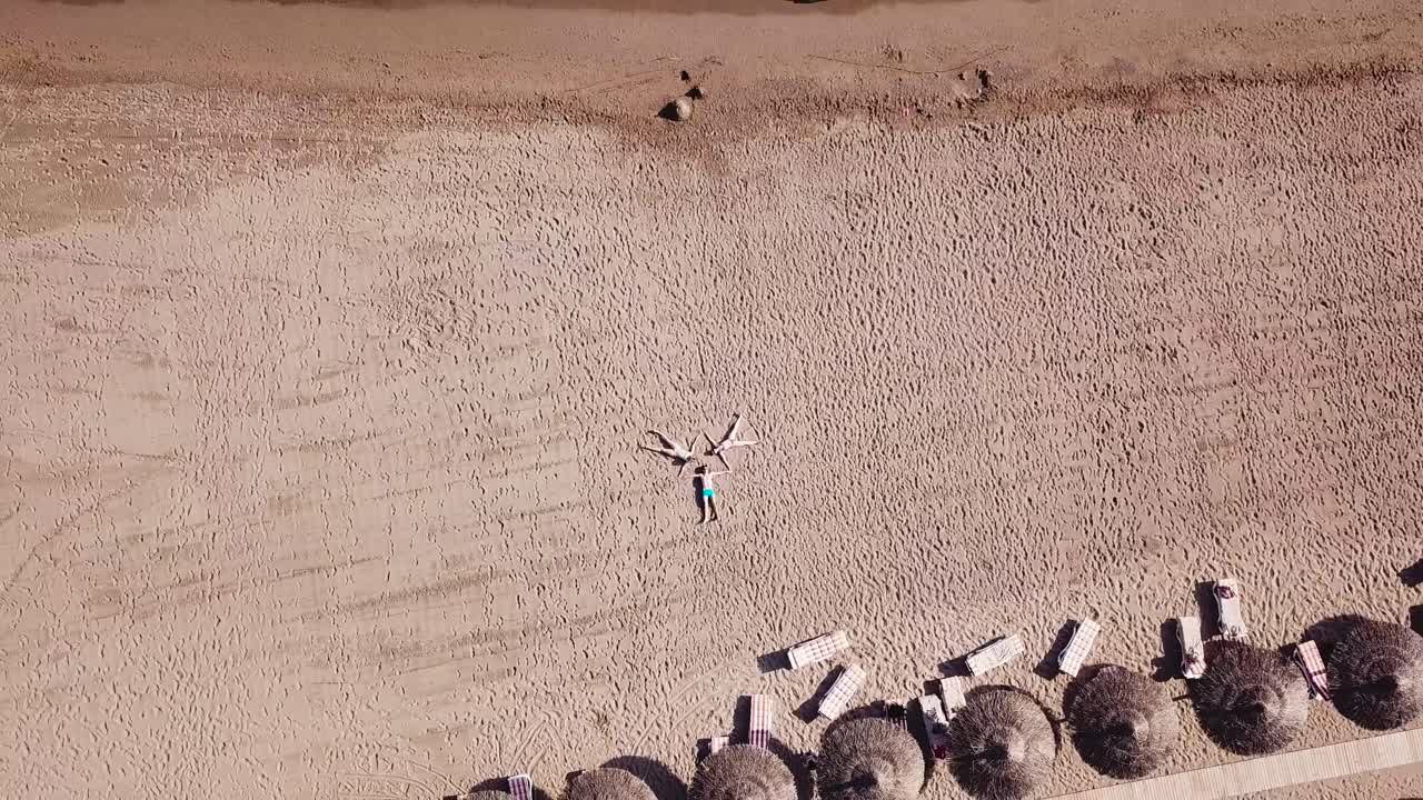 Beach Aerial View with People Sunbathing