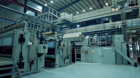 aerial-shot-of-a-production-factory-hangar-made-of-metal-frame