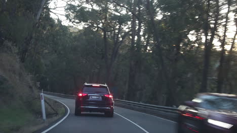 point of view of driver or passenger driving along non-descriptive australian mountain highway