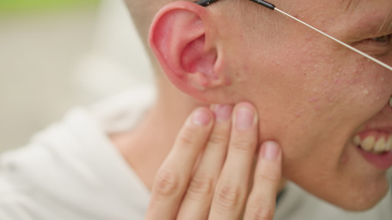 Cheerful man outside, Caucasian athletic man experiencing cheerful moment outdoors during rain, Contented athlete participating in outdoor activity amidst rainy weather with joyful smile on face