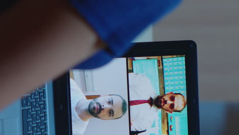 vertical video: freelancer having video conference with team