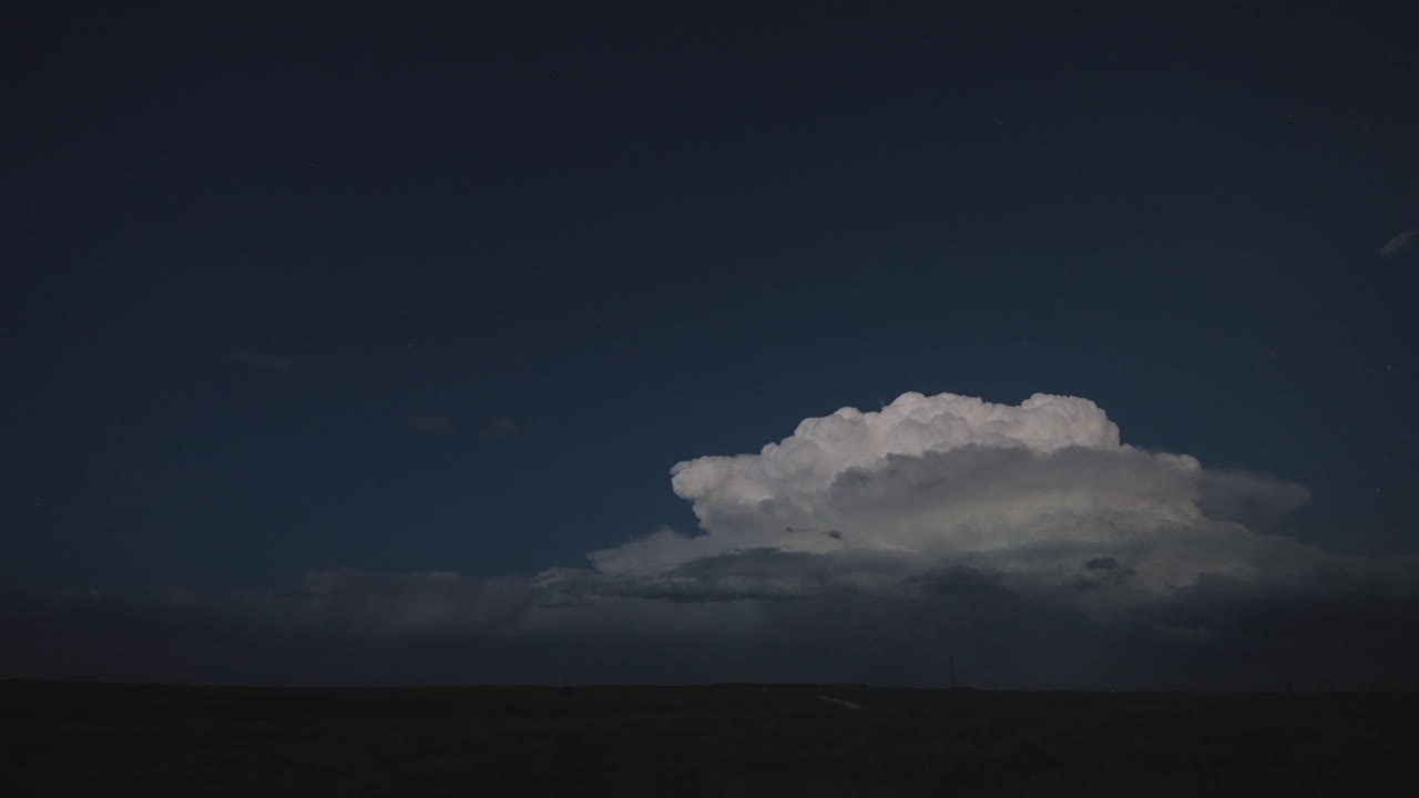 Dramatic Cloud Formation Against a Dark Night Sky
