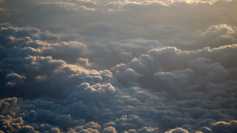 a high-altitude view of a dense cloud cover at sunrise or sunset.