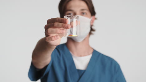 Caucasian-man-in-front-of-camera-on-white-background.