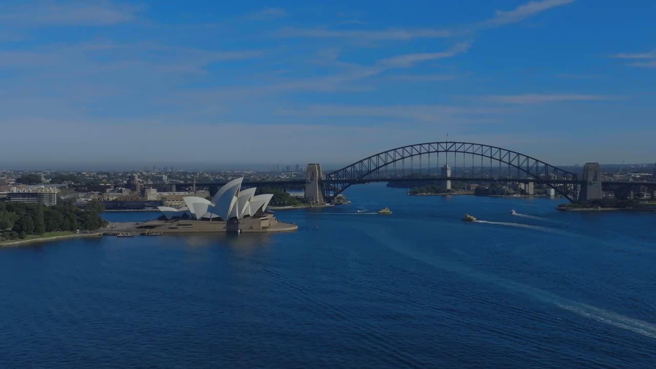 시드니 오페라 하우스와 하버 브리지의 넓은 공중 촬영