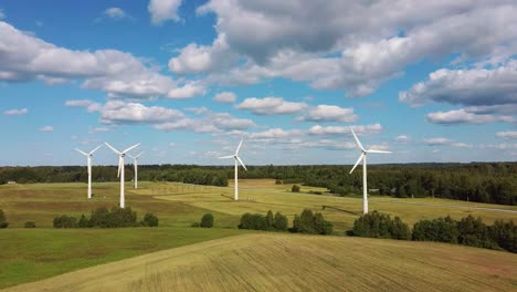 aerial view of wind farm or wind park, with high wind turbines for generation electricity