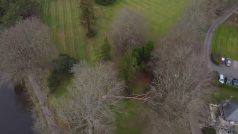 beautiful gothic castle in british countryside surround by gorgeous lake in wales