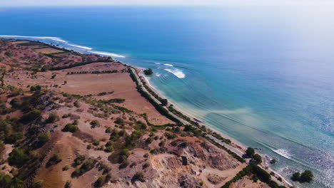 serene beach of sumbawa island near offshore bungin island in indonesia. aerial drone shot