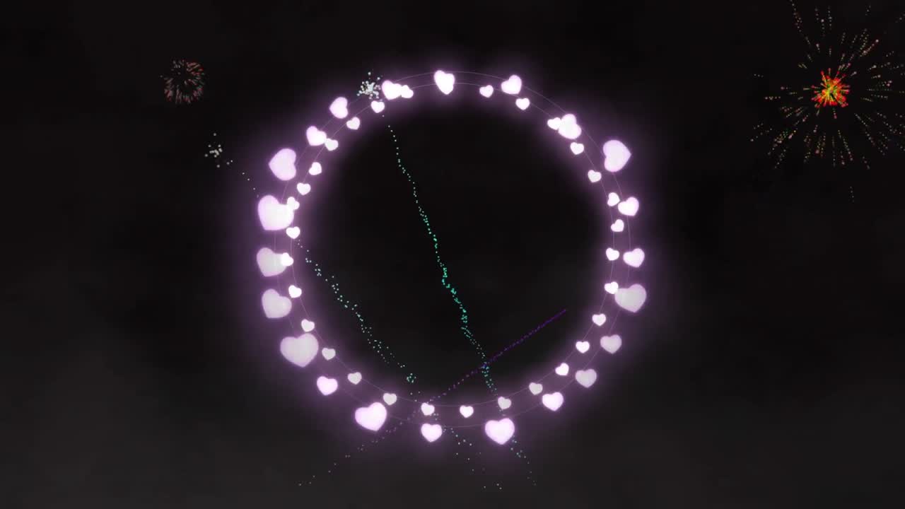 Animation of circle of heart fairy lights with christmas and new year fireworks in night sky