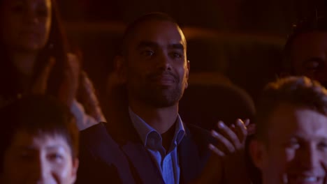 mixed-race businessman applauding in business seminar at auditorium 4k