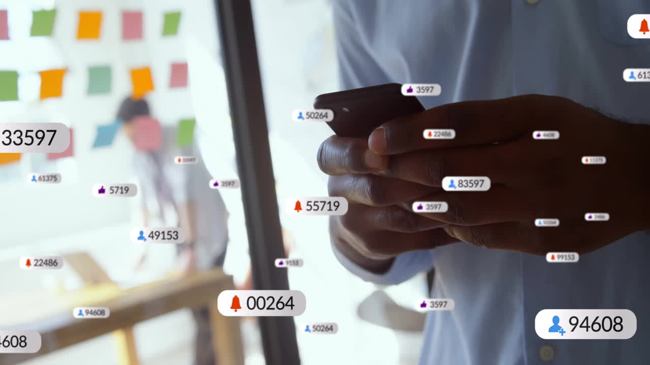 Animation of social media icons with number over african american businessman using smartphone