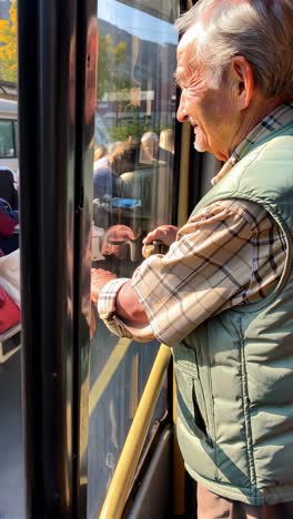 senior traveler standing on a crowded bus, lost in thought while exploring the city.