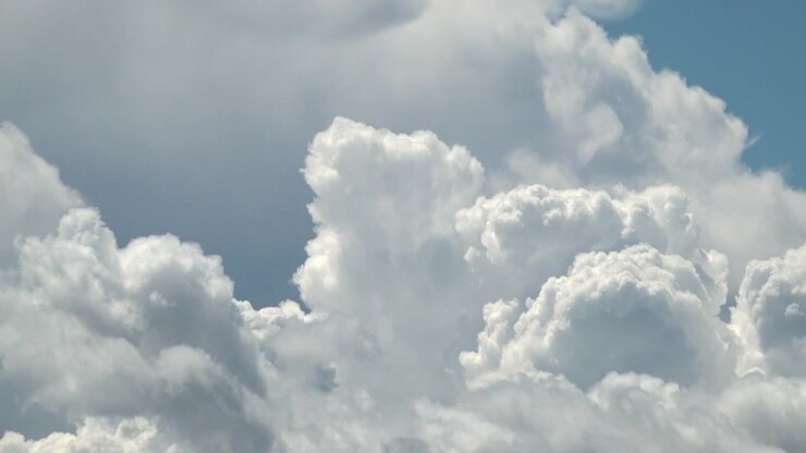 A time lapse large Cumulous Nimbus storm clouds building.