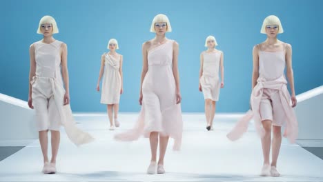 a stunning fashion showcase featuring models in elegant light pink dresses on a modern runway, highlighting contemporary design and unique aesthetics