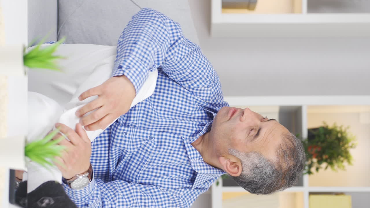 Vertical video of Sad man with private life problems.