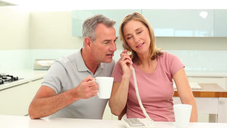 Mature-couple-talking-on-the-phone