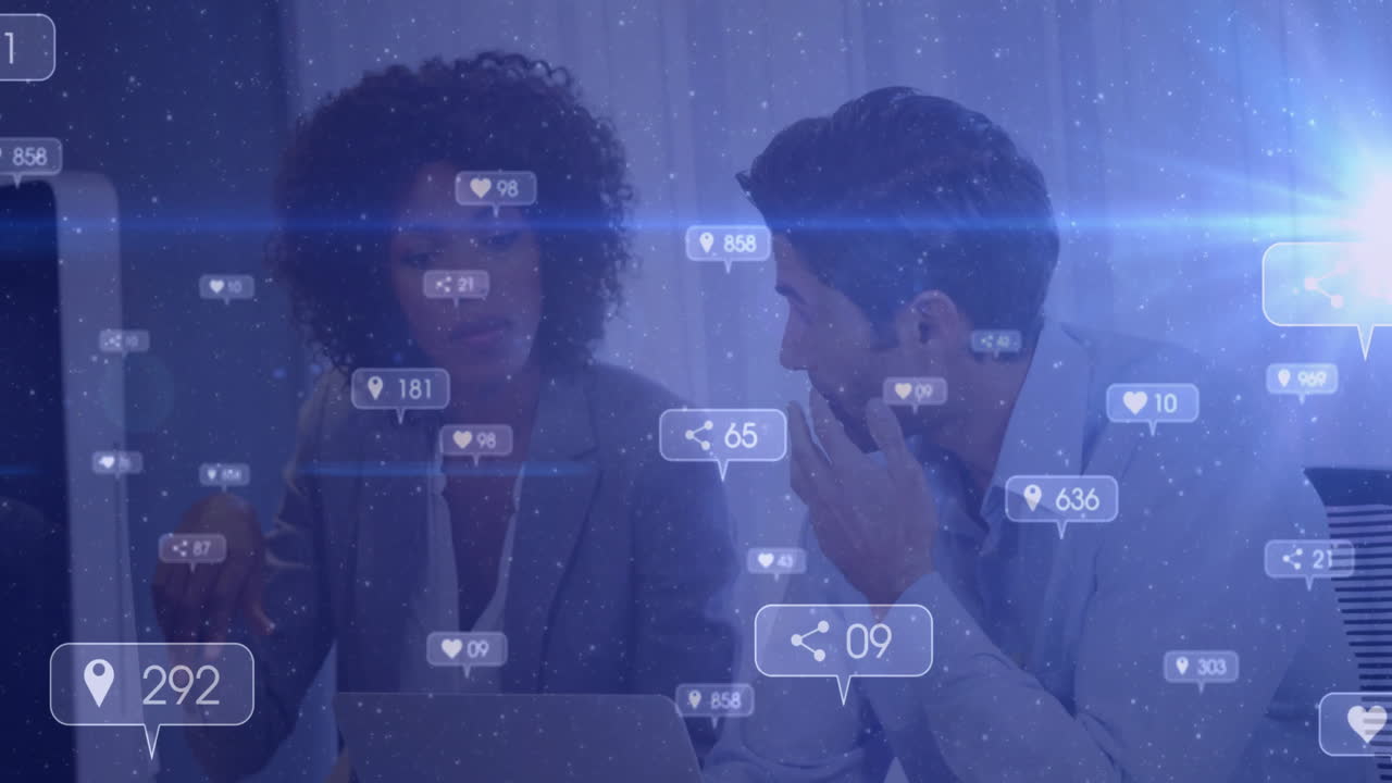 Discussing social media analytics, diverse professionals with digital animation icons overlay