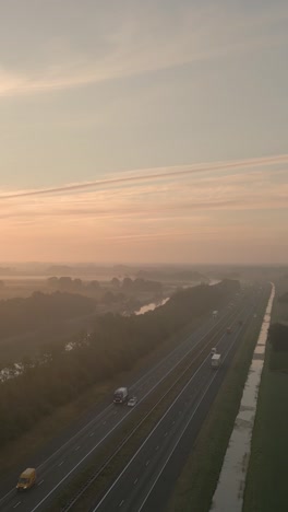 sunrise highway view with foggy landscape