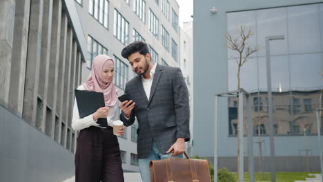 business people discussing on street