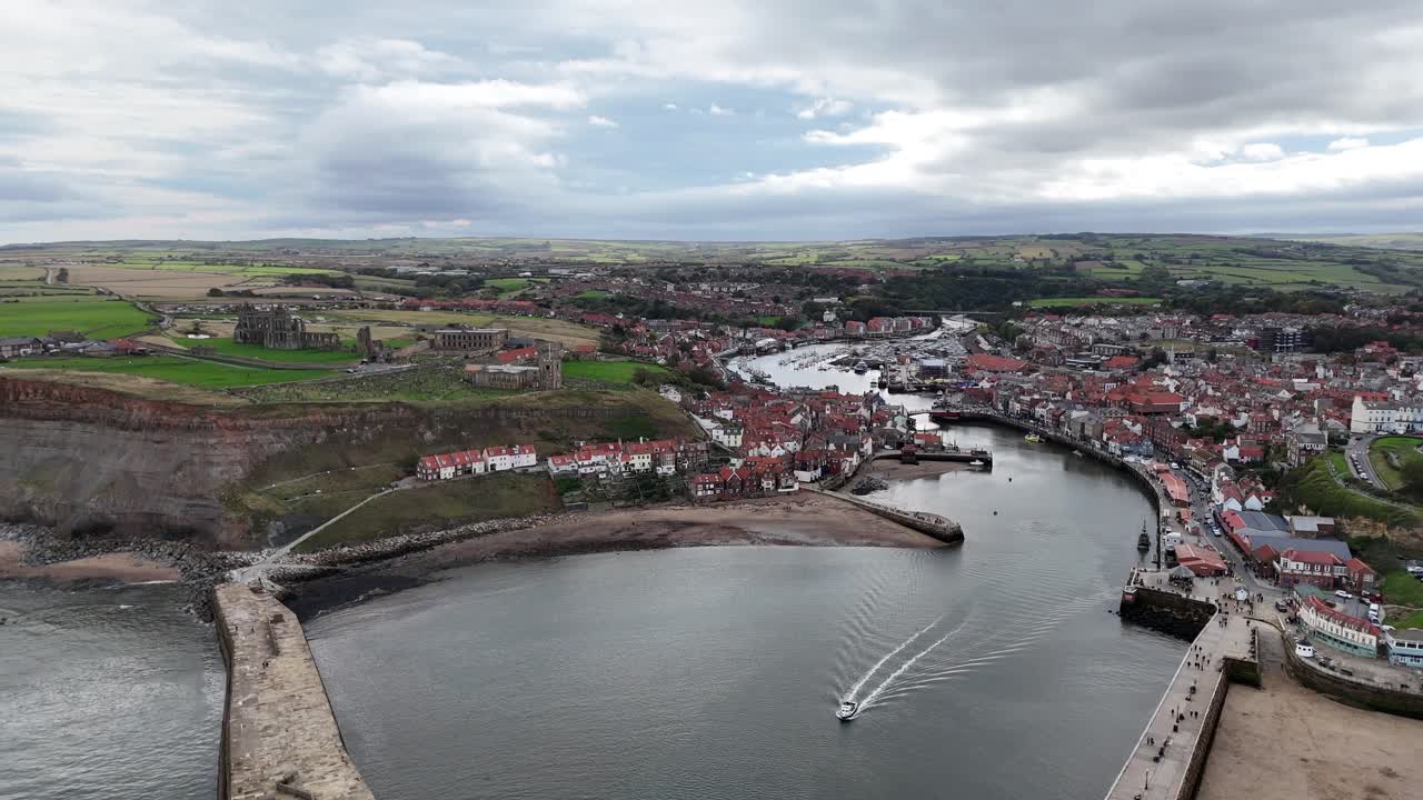 Aerial drone view Whitby Abbey north yorkshire british english seaside port harbour town city england uk