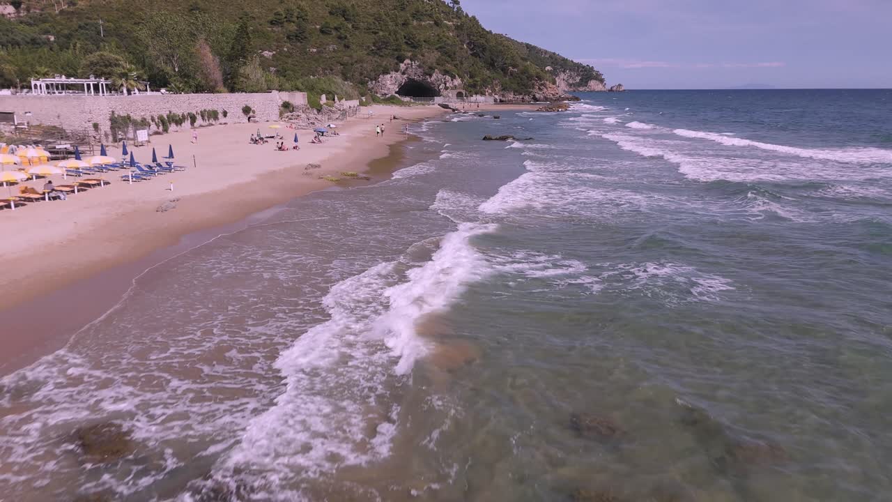 Drone Flight Over the Turquoise Waters of Sperlonga Beach