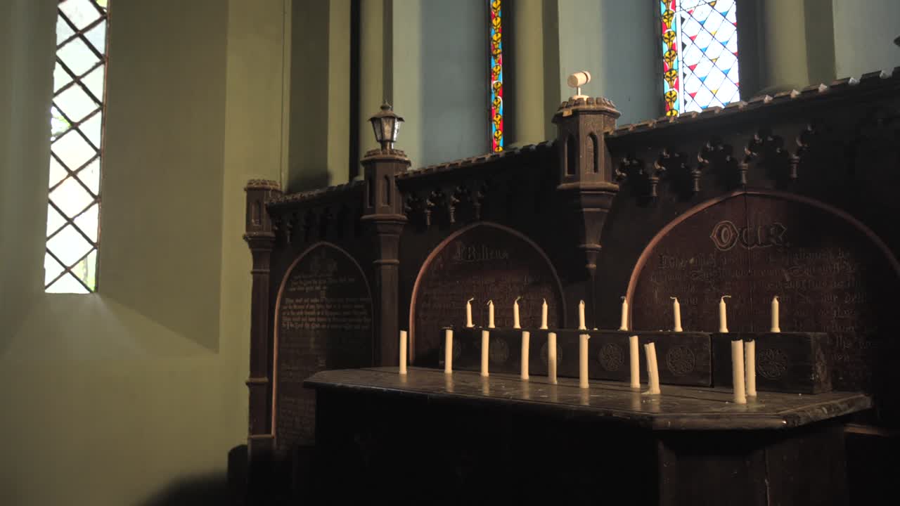 candle place on table in st Thomas chrch in satara