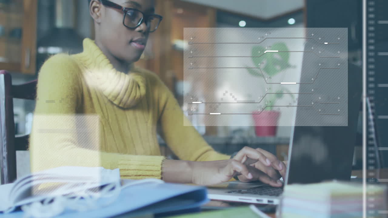 Typing on laptop with digital data animation, person in yellow sweater working