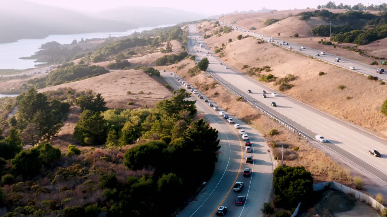 Aerial View of Highway Traffic and Scenic Landscape