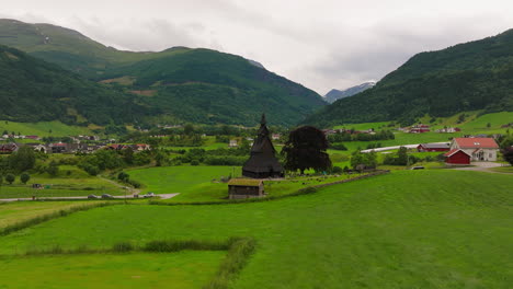 hopperstad stave church in green countryside, vik, norway