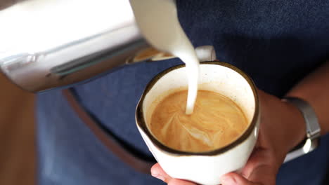 waitress doing latte art