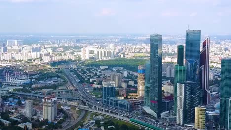 aerial view of moscow cityscape with skyscrapers and traffic