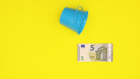 euro banknotes changing and value growing when water drops fall - stop motion