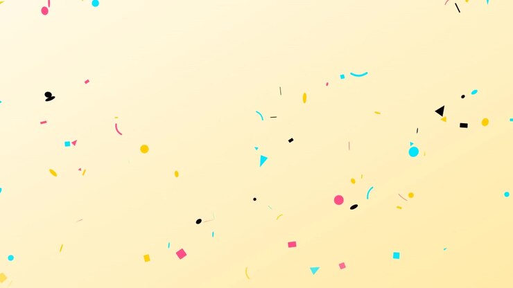 Coriandoli colorati che cadono su un morbido sfondo giallo