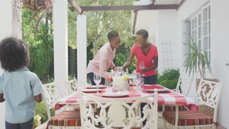 Happy-family-eating-together-at-table