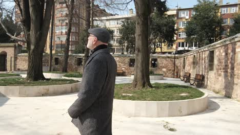 Man-entering-mosque-courtyard