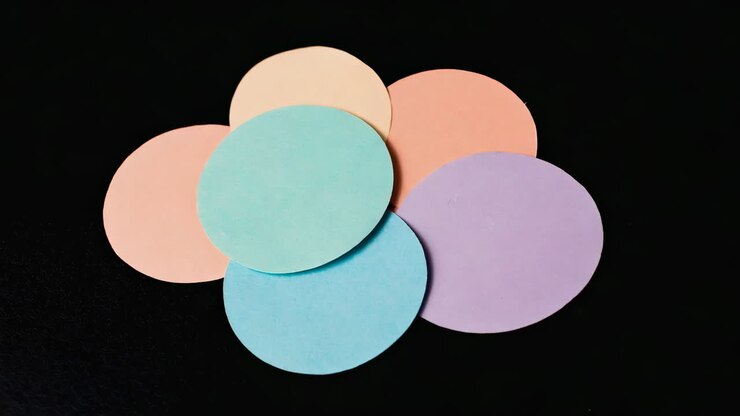 Abstract Pastel Ovals on Black Background
